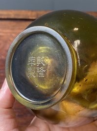 A rare Chinese translucent green Peking glass bottle vase, Qianlong mark and of the period