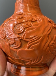 A Chinese coral-red Peking glass bottle vase, Daoguang mark and probably of the period