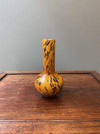 A Chinese spotted amber-coloured Peking glass bottle vase, Xianfeng mark and of the period