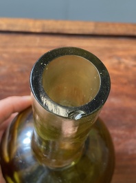 A rare Chinese translucent green Peking glass bottle vase, Qianlong mark and of the period