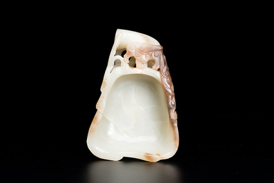 A Chinese white and russet jade lotus-form brush washer and two covered vases, Qing