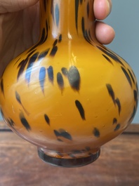 A Chinese spotted amber-coloured Peking glass bottle vase, Xianfeng mark and of the period