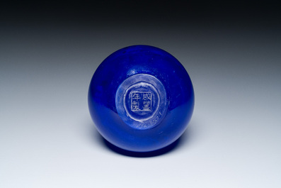 A Chinese translucent blue Peking glass bottle vase, Xianfeng mark and of the period