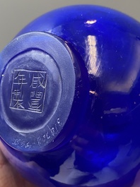 A Chinese translucent blue Peking glass bottle vase, Xianfeng mark and of the period
