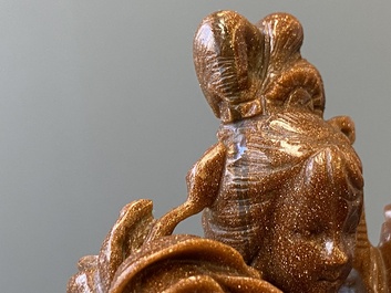 Three Chinese lapis lazuli and goldstone carvings, 19/20th C.