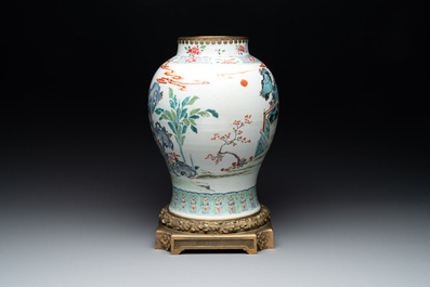 A Chinese famille rose gilt bronze mounted vase with figural design, Yongzheng