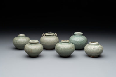 Six Chinese Longquan celadon jarlets with incised floral design, Yuan/Ming
