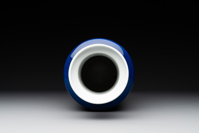 A Chinese monochrome powder blue rouleau vase, 19th C.