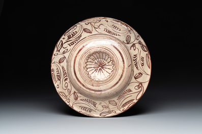 A Spanish Hispano-Moresque lustre-glazed dish with raised central medallion, Manises, 16th C.