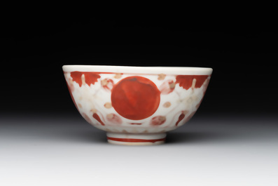 A Chinese iron-red, blue and white 'kinrande' bowl for the Japanese market, Ming
