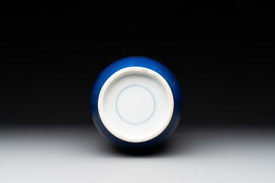 A Chinese monochrome powder blue rouleau vase, 19th C.