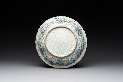 A Chinese blue and white 'phoenix' dish and two 'Buddhist lion' and 'peony' plates, Hongzhi/Zhengde