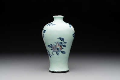 A rare Chinese blue, white and iron-red celadon-ground 'pomegranate' 'meiping' vase, Qianlong mark and of the period