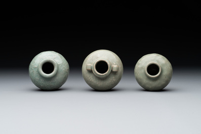 Six Chinese Longquan celadon jarlets with incised floral design, Yuan/Ming