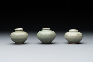 Six Chinese Longquan celadon jarlets with incised floral design, Yuan/Ming