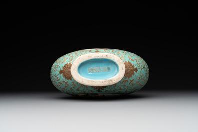 A Chinese gilt-decorated famille rose turquoise 'monkeys' and 'dogs' moon flask, Qianlong mark, 20th C.