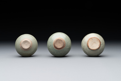Six Chinese Longquan celadon jarlets with incised floral design, Yuan/Ming