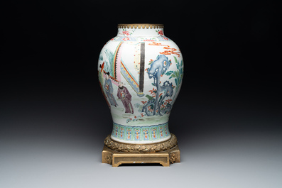 A Chinese famille rose gilt bronze mounted vase with figural design, Yongzheng