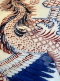 A Chinese blue, white and copper-red 'dragon and phoenix' vase, 19th C.