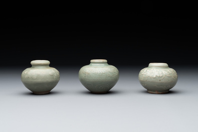 Six Chinese Longquan celadon jarlets with incised floral design, Yuan/Ming
