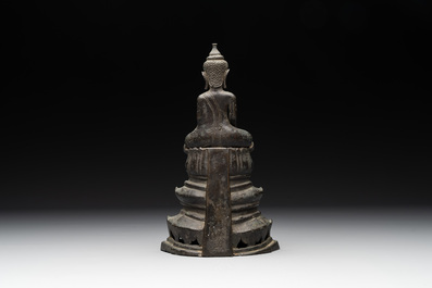A Laotian bronze figure of a seated Buddha, 19th C.