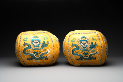 A pair of Chinese yellow-ground embroidered silk 'dragon' cushions, 19th C.