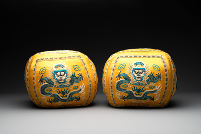 A pair of Chinese yellow-ground embroidered silk 'dragon' cushions, 19th C.