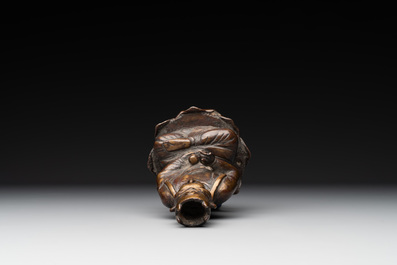 A Chinese bronze seated Guanyin on a lotus throne, probably Liao