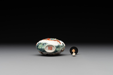 A Chinese famille rose relief-molded snuff bottle with narrative design, Xianfeng mark and of the period