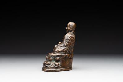 A Tibetan bronze Padmasambhava, 14th C.