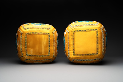A pair of Chinese yellow-ground embroidered silk 'dragon' cushions, 19th C.