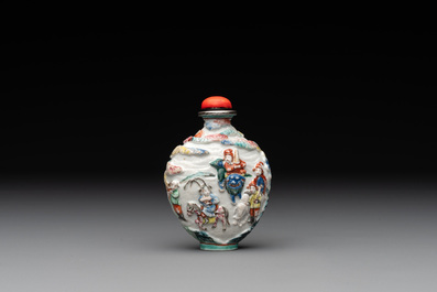 A Chinese famille rose relief-molded snuff bottle with narrative design, Xianfeng mark and of the period