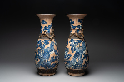 A pair of Chinese Nanking blue and white crackle-glazed 'phoenix' vases, 19th C.