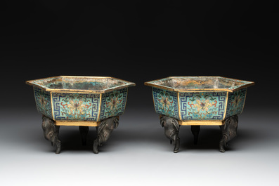 A pair of Chinese cloisonn&eacute; 'lotus and elephant' jardini&egrave;res, 18/19th C.