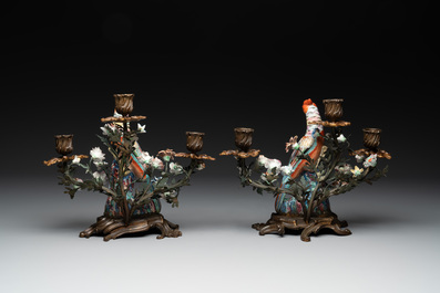 A pair of candle holders mounted with Chinese famille rose models of pheasants, Qianlong