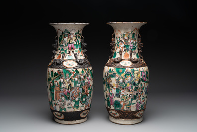 Seven various Chinese Nanking blue and white, famille rose and verte crackle-glazed vases, 19th C.