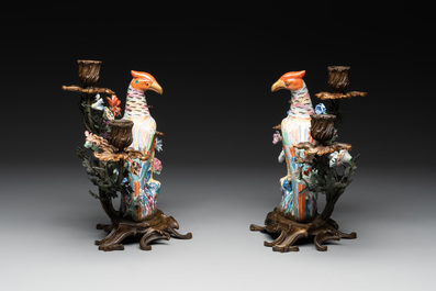A pair of candle holders mounted with Chinese famille rose models of pheasants, Qianlong