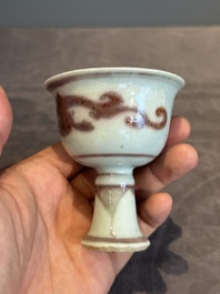 A Chinese copper-red and white 'chilong' stem cup, Ming