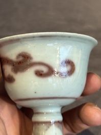 A Chinese copper-red and white 'chilong' stem cup, Ming