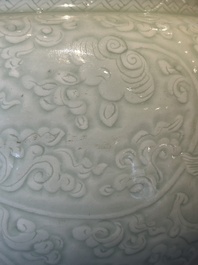 A Chinese incised celadon-glazed bowl with chilong and floral design, Kangxi