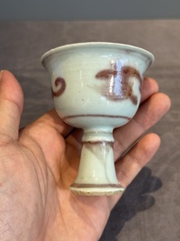A Chinese copper-red and white 'chilong' stem cup, Ming