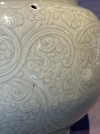 A Chinese incised celadon-glazed bowl with chilong and floral design, Kangxi