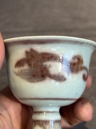 A Chinese copper-red and white 'chilong' stem cup, Ming