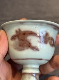 A Chinese copper-red and white 'chilong' stem cup, Ming