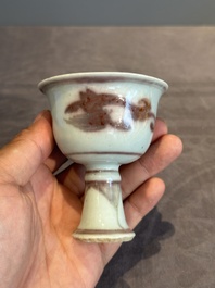 A Chinese copper-red and white 'chilong' stem cup, Ming