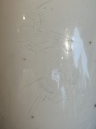 A Chinese white-glazed anhua 'birds' jar, Transitional period