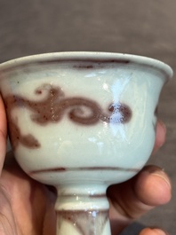 A Chinese copper-red and white 'chilong' stem cup, Ming