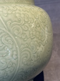 A Chinese incised celadon-glazed bowl with chilong and floral design, Kangxi