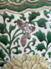 A Chinese famille verte jar with floral design and a wooden cover, Kangxi