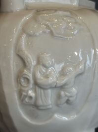 A large Chinese Dehua blanc de Chine wine pot, Kangxi
